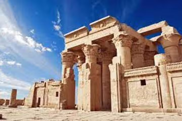 Edfu Temple grand pylon and columns on Nile cruise stop from Aswan to Luxor overnight tour in Egypt