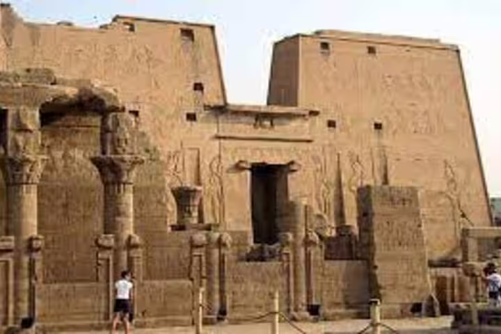 Ancient pylons and ruins at Edfu Temple on Aswan to Luxor overnight trip, including Kom Ombo and Edfu temples