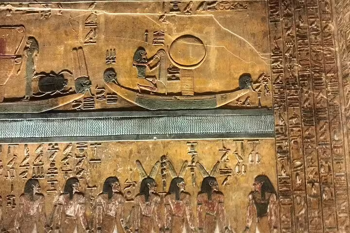 Ancient Egyptian hieroglyphs and temple reliefs on 6-day Egypt Cairo pyramids Aswan felucca tour