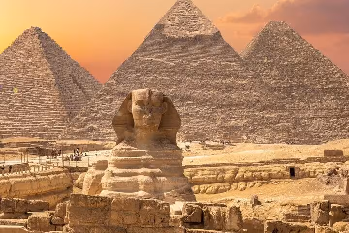 Great Sphinx and Giza Pyramids at sunset in Cairo, must-see stop on 7 days 6 nights Egypt Nile cruise tour