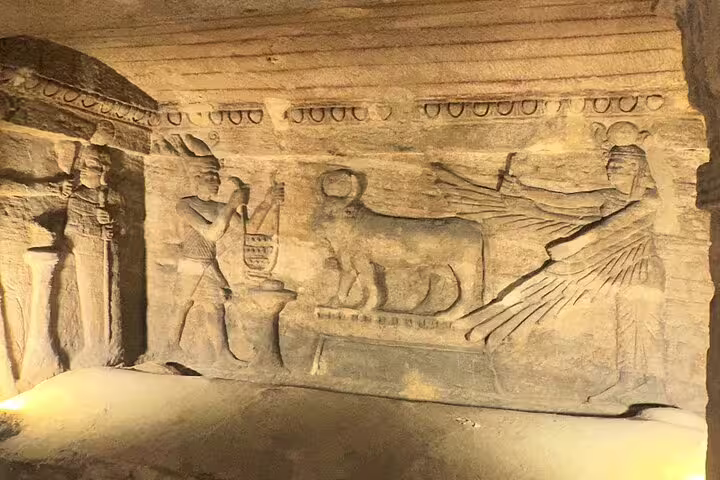 Ancient Egyptian tomb wall relief carving, a highlight on 6-day Egypt tours package in Luxor