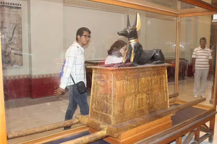 Egyptian Museum exhibit of Anubis jackal shrine on private tour, no hidden cost, guided cultural sightseeing in Cairo