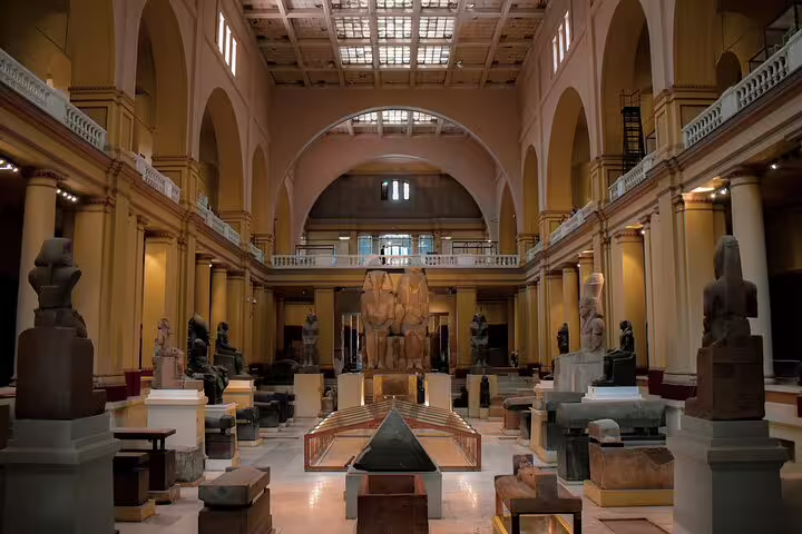Grand hall of the Egyptian Museum Cairo with statues and exhibits, Cairo day trip from Alexandria