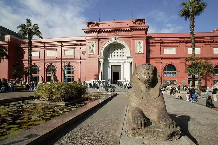 Egyptian Museum Cairo exterior with sphinx statue, key stop on Giza Pyramids and Khan El Khalili day tour