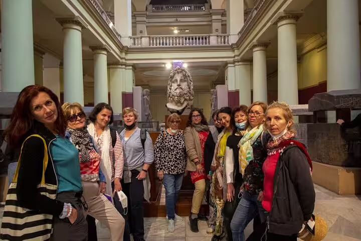 Small group with guide inside Egyptian Museum Cairo gallery on a 4-hour private day tour