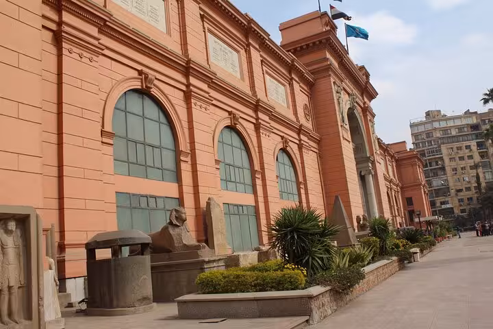 Egyptian Museum Cairo exterior on tour, gateway to Tutankhamun mask optional visit and artifacts