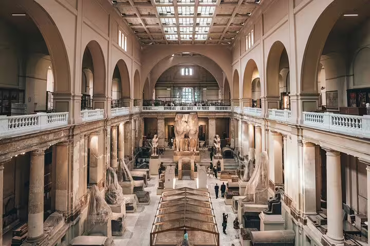 Grand Egyptian Museum interior gallery with statues, perfect for a 4-hour private guided Cairo day tour