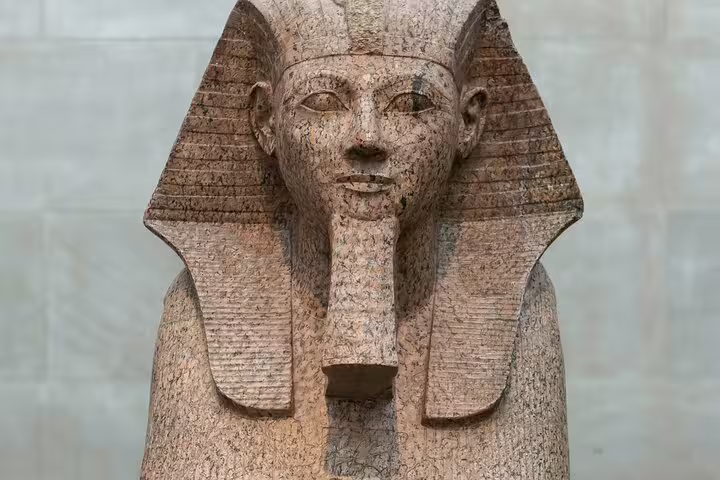 Ancient Egyptian pharaoh statue at the Egyptian Museum, Cairo, on private tour with no hidden costs