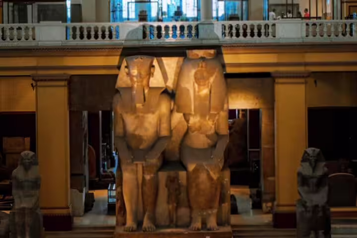 Ancient Egyptian pharaoh statues inside the Egyptian Museum Cairo on a private day tour from Port Said