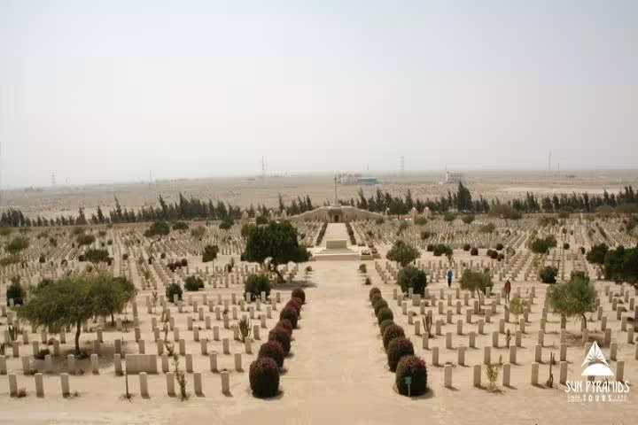 El Alamein war cemetery with rows of graves in desert landscape, visited on El-Alamein day tour from Cairo