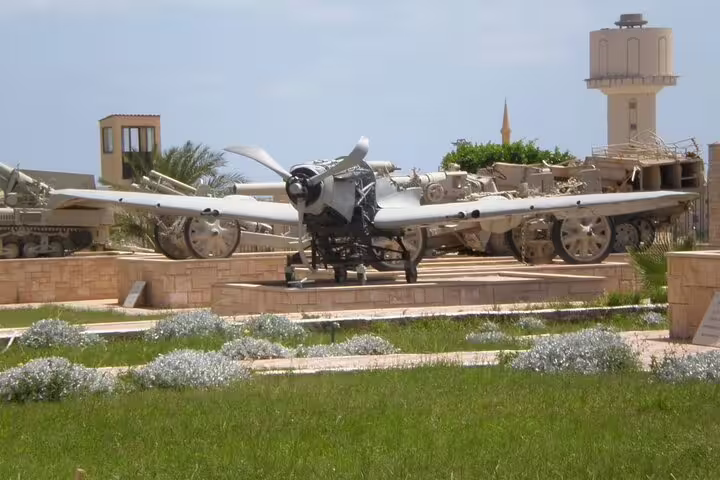Historic WWII fighter plane and tanks display at El Alamein Military Museum, Cairo day trip highlight