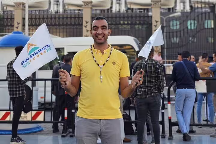 Friendly El Sokhna port tour representative meeting cruise travelers for private Pyramids, Citadel and bazaar tour
