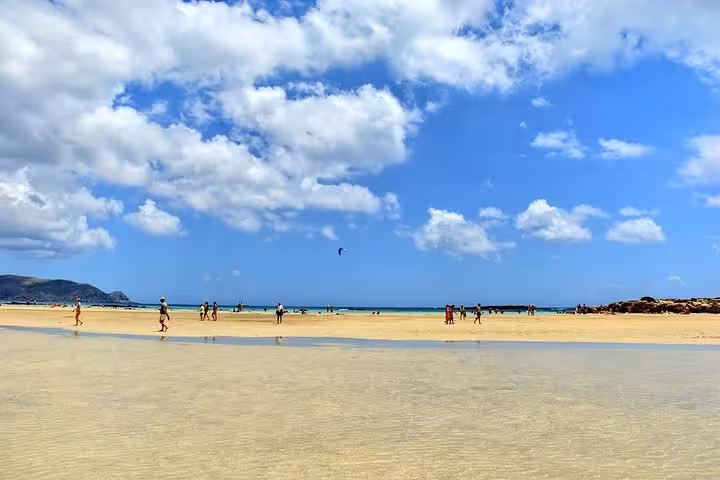 Elafonissi Beach lagoon with shallow turquoise water and sandy flats on a private day trip from Chania