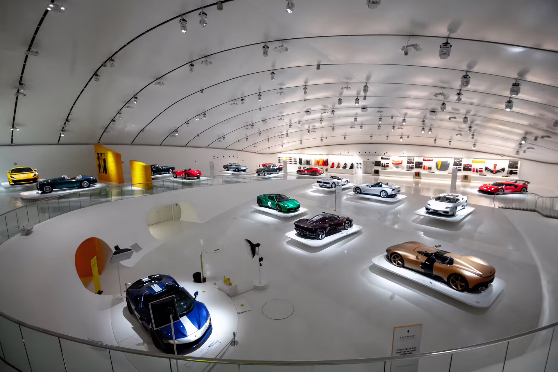Panoramic view of Enzo Ferrari Museum Modena gallery with supercars and exhibits, skip-the-line entry