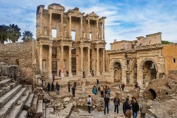 Visitors exploring the historic ruins of Ephesus Ancient City, a highlight of the private tour from Kusadasi.