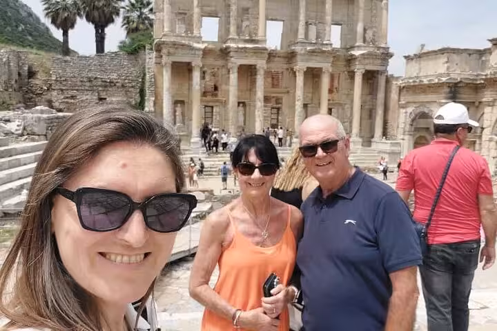 Travelers at the Library of Celsus on Ephesus tour from Bodrum, Turkey, guided day trip photo stop