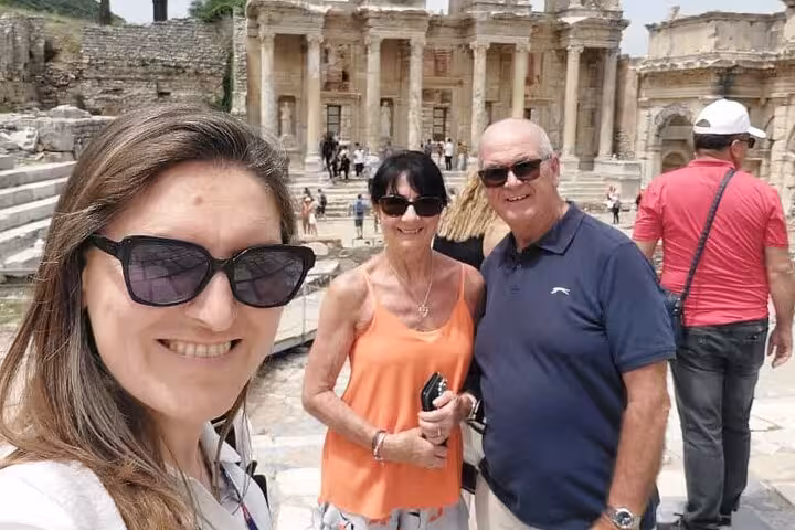 Cruise passengers selfie at Ephesus Library of Celsus on guided shore excursion tour with lunch in Turkey