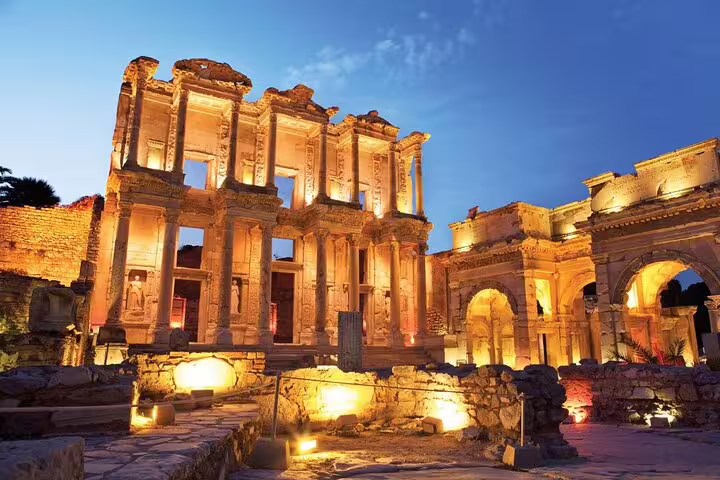 Illuminated Library of Celsus at Ephesus at dusk on a shore excursion from Izmir Cruise Port