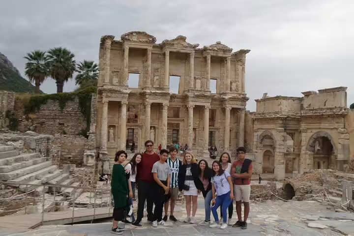 Travel group at Library of Celsus in Ephesus on private tour from Izmir Port, guided ancient city visit