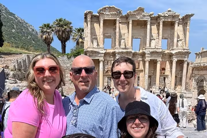 Happy travelers at Ephesus Library of Celsus on Ephesus tour from Izmir hotels, Turkey day trip
