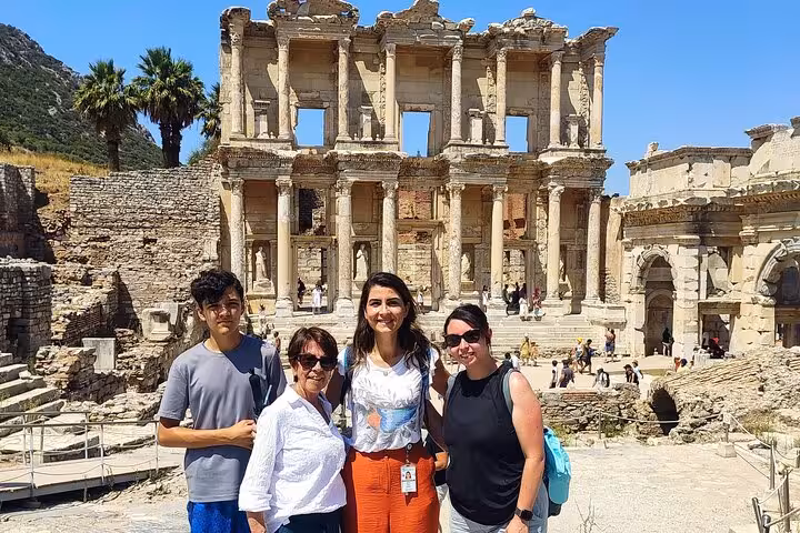 Guided Ephesus shore excursion from Kusadasi featuring Library of Celsus photo stop with travelers