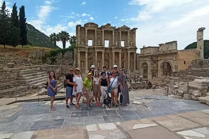 Visitors enjoying the historical site of Ephesus during a private shore excursion from Kusadasi Port.