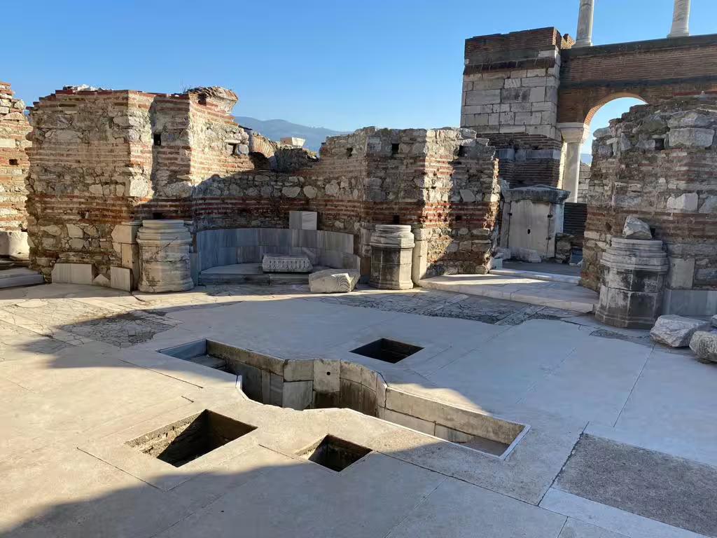 Ruins of Roman bath complex in Ephesus on a private all inclusive Istanbul to Ephesus day trip with flights