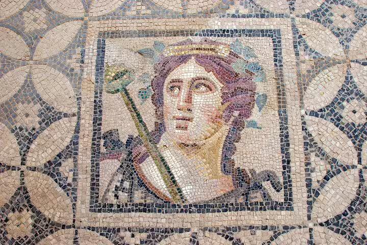 Detailed mosaic of a Roman deity in Ephesus, perfect for Kusadasi private shore excursion highlights.