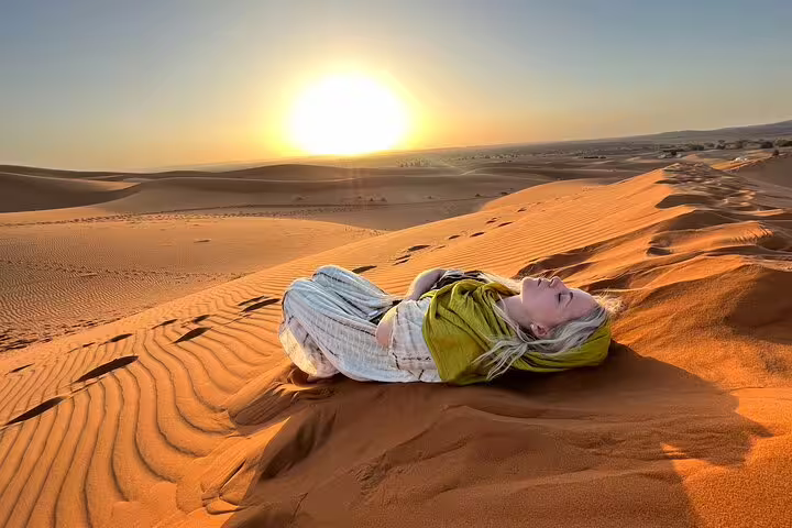 Sunset over Erg Chebbi dunes in Merzouga, Sahara desert experience on a 3-day private tour from Marrakech