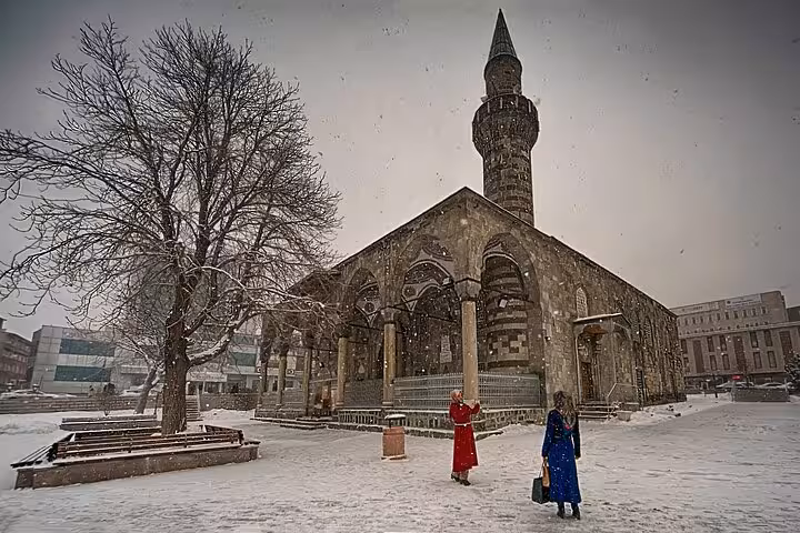 Snowy Erzurum city tour view of historic Lala Mustafa Pasha Mosque, winter private guided sightseeing
