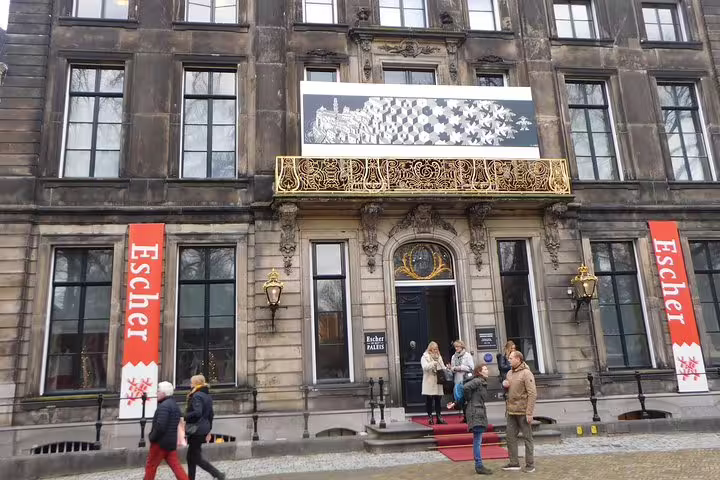 Escher in Het Paleis museum facade in The Hague, clue stop on self-guided e-scavenger hunt tour