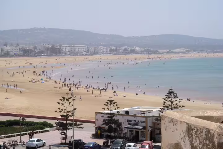 Panoramic Essaouira beach shoreline and bay view, popular photo stop on a private day trip from Marrakech