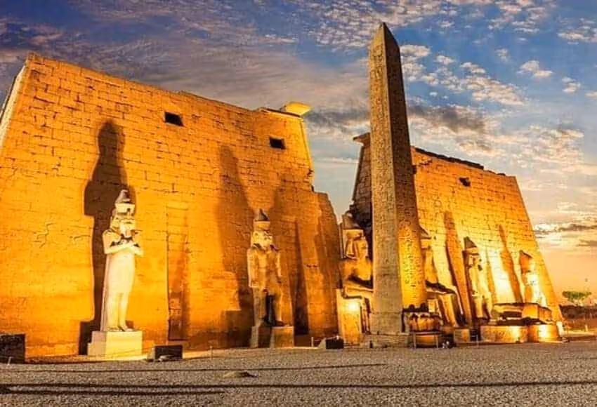 Evening Luxor trip to Karnak Temple with illuminated statues and obelisk at sunset, guided night tour Egypt