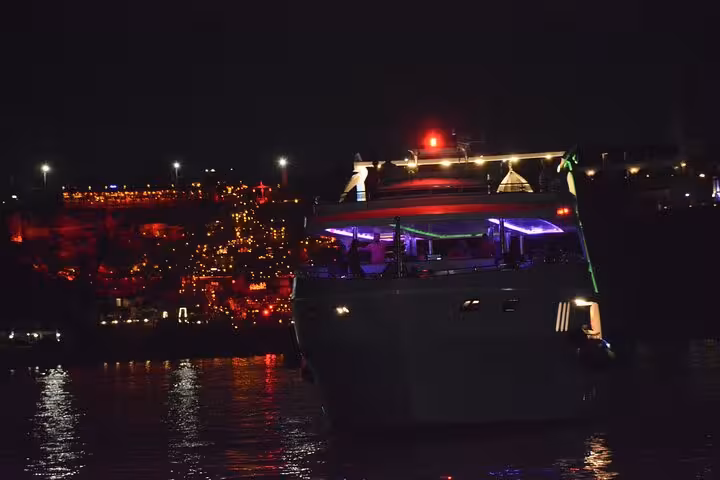 Night yacht cruise in Sharm El Sheikh with illuminated deck, oriental dinner and belly dance entertainment