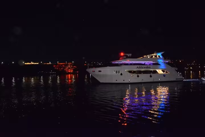 Evening Oriental dinner cruise in Sharm El Sheikh on illuminated yacht, Red Sea night views and entertainment