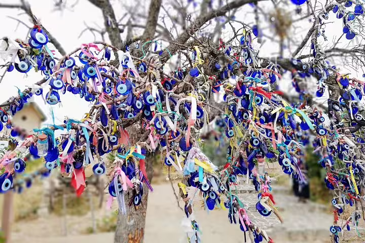 Evil eye wish tree with blue nazar charms, a cultural stop on the 7 Churches of Revelation Turkey tour