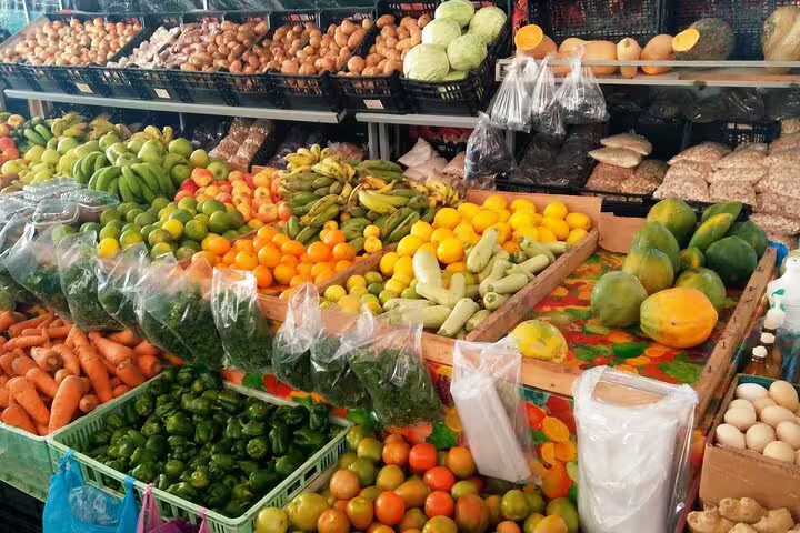 Vibrant produce market on Fogo Island showcasing fresh fruits and vegetables, perfect for culinary exploration.
