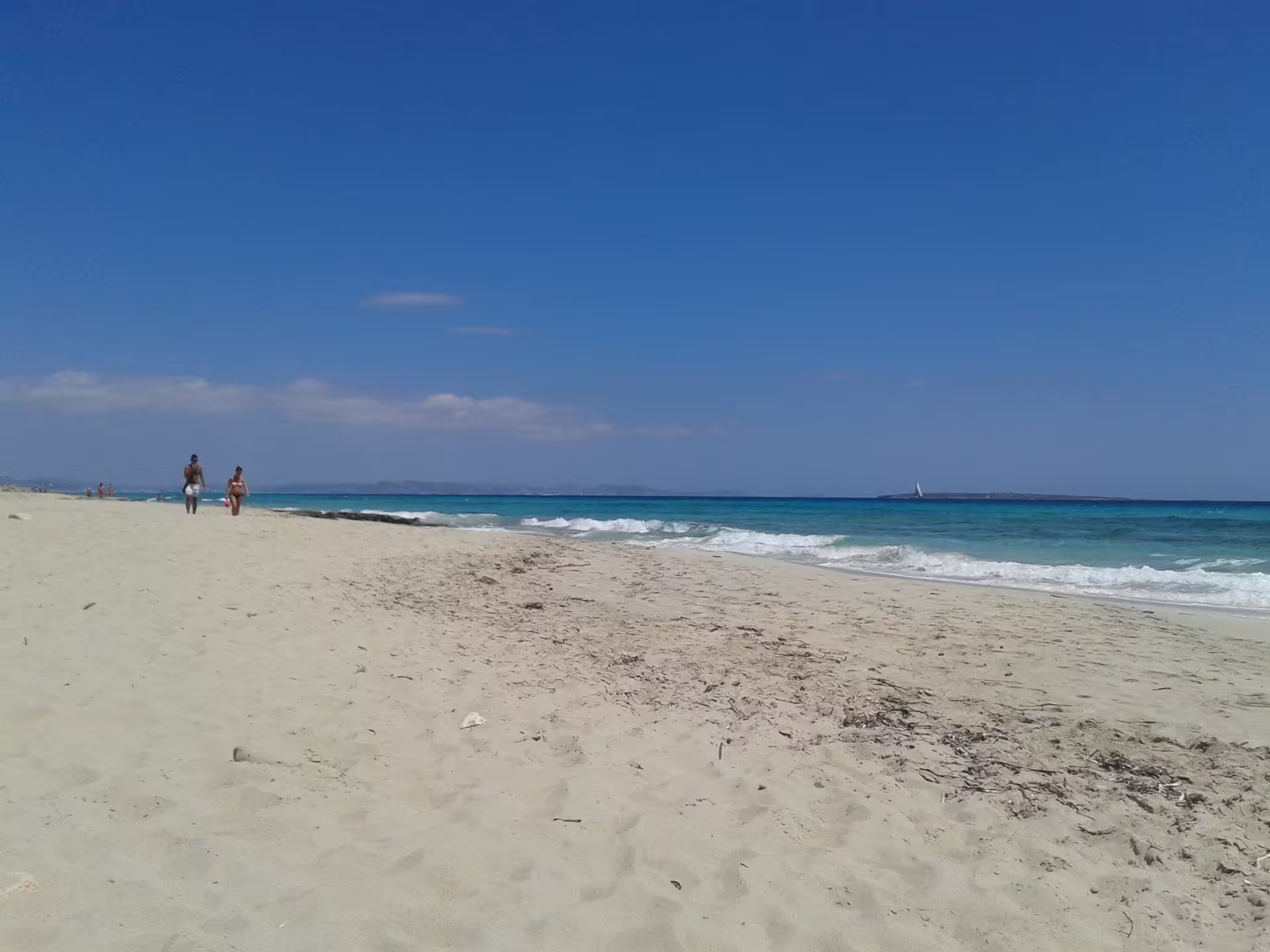 Formentera white-sand beach and turquoise sea on Ibiza day trip with fast ferry transfers and beach time