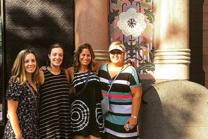 Tourists enjoying a sunny day outside Casa Vicens on a Gaudi houses private tour with skip-the-line access.