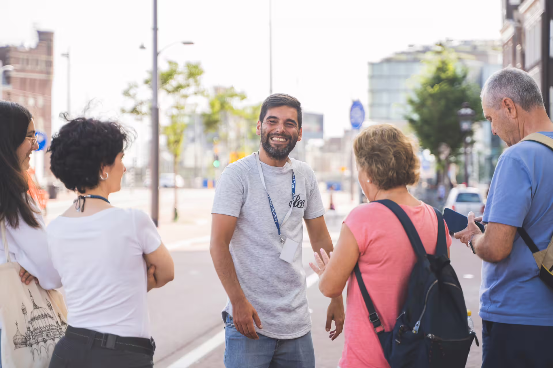Tour guide leading a group through the charming streets of Ghent on a private walking tour in the historical heart of Flanders.