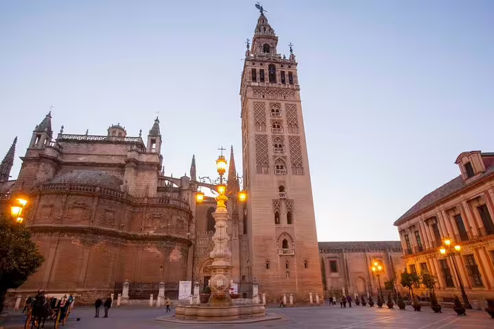 Giralda tower and Seville Cathedral at sunset, ideal landmark stop on a self-guided e-scavenger hunt