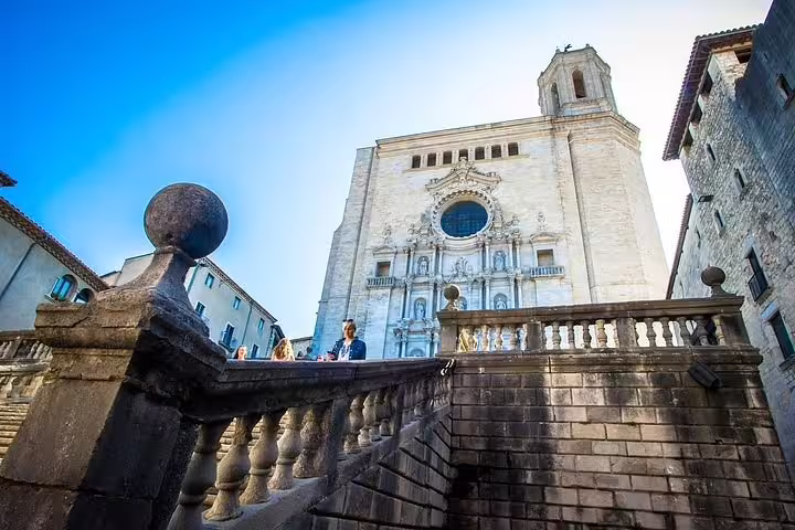 Stone staircase leading to Girona Cathedral, a highlight of the Girona Tour offering historical insights.