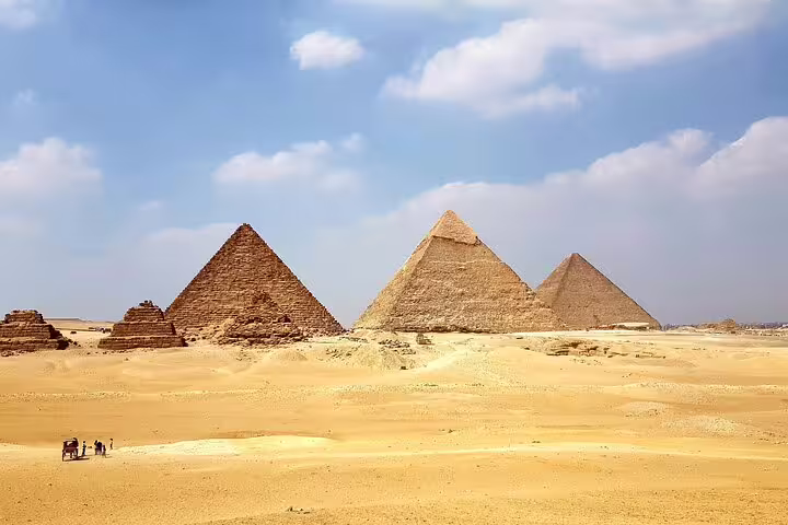 Three pyramids of Giza in Cairo desert, classic photo stop on luxury Memphis, Saqqara and Dahshur tour