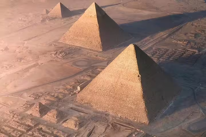 Aerial view of the Giza Pyramids in Cairo desert on a private 3-hour tour with camel ride option