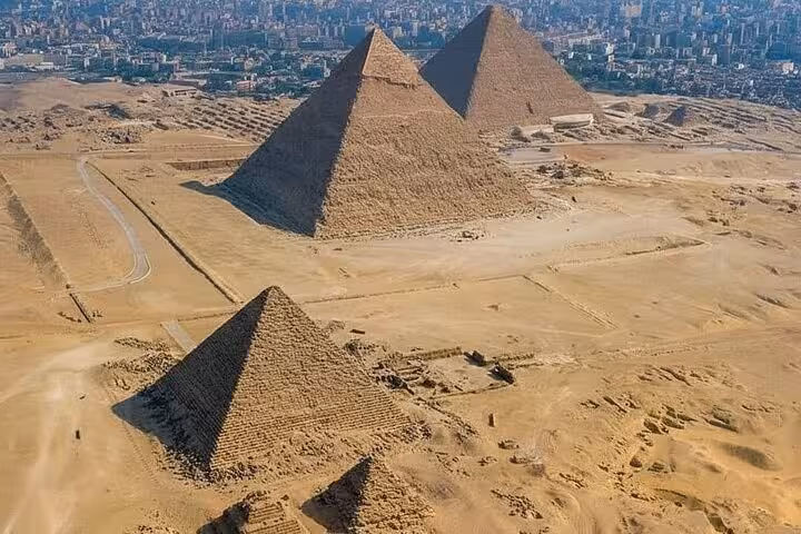 Aerial view of the Giza Pyramids plateau in Cairo, top stop on Hurghada to Cairo bus tour with lunch