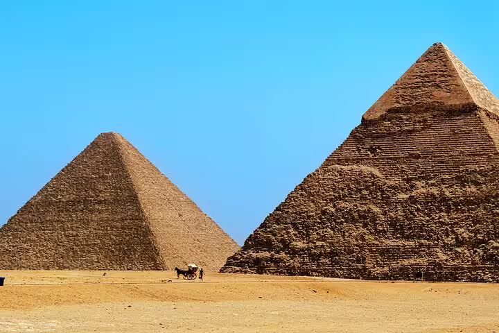 Two Great Pyramids of Giza rising from the desert, ideal photo stop on a private Cairo pickup guided tour