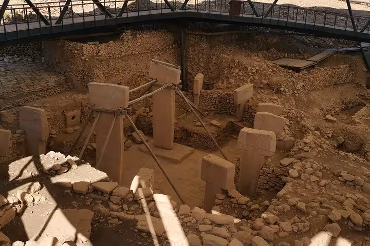 Göbeklitepe T-shaped pillars under protective roof in Şanlıurfa, highlight of private Göbeklitepe tour from Istanbul by plane