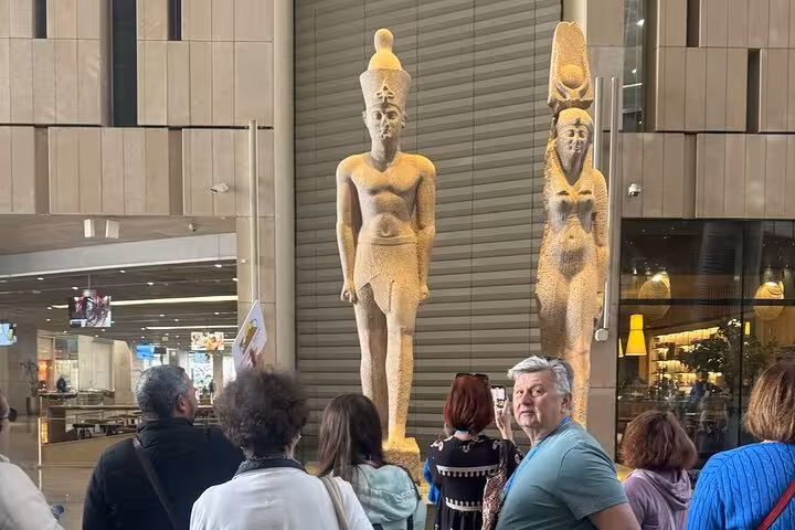 Private Grand Egyptian Museum tour with colossal ancient Egyptian statues in the main atrium, Cairo