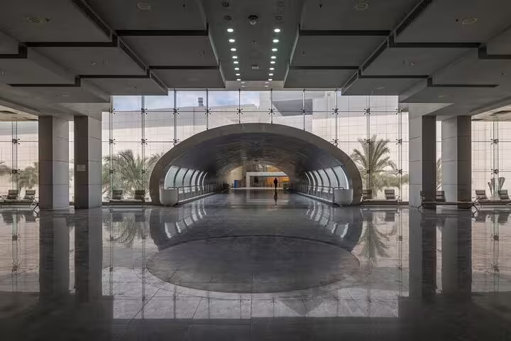 Grand Egyptian Museum Cairo entrance hall with modern glass atrium, key stop on museum and Citadel tour