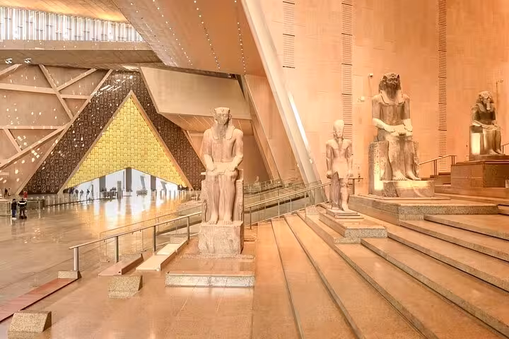 Statues and ramps inside Grand Egyptian Museum Cairo, ideal add-on to Giza Pyramids flight tour